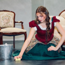 Cinderella washing floors.